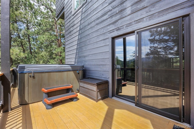4477 Independence Trl, Evergreen, CO 80439 - wooden terrace featuring a hot tub