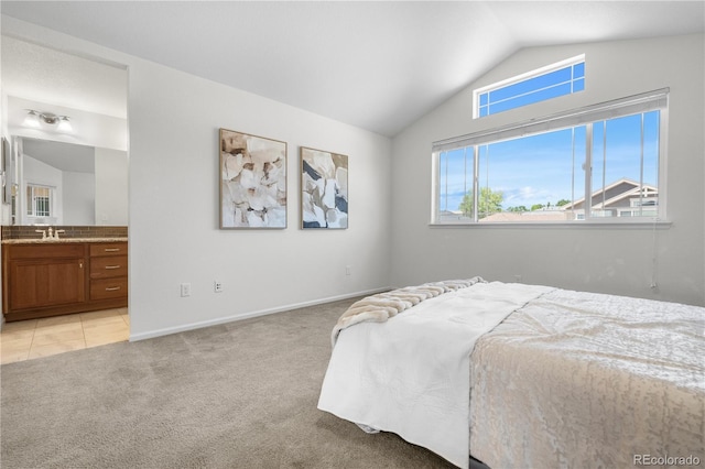 14892 E Poundstone Dr, Aurora, CO 80015 - bedroom featuring lofted ceiling, light colored carpet, and ensuite bath