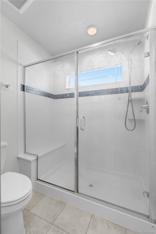 14892 E Poundstone Dr, Aurora, CO 80015 - full bath featuring a shower stall and tile patterned floors