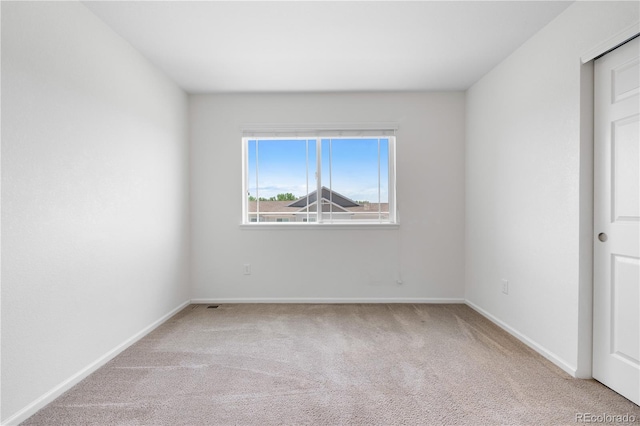 14892 E Poundstone Dr, Aurora, CO 80015 - spare room with carpet floors and baseboards