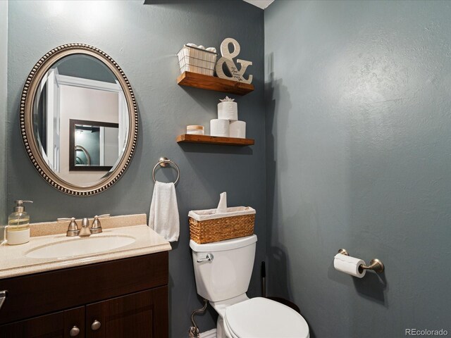 7554 S Ogden Way, Centennial, CO 80122 - bathroom with toilet and vanity