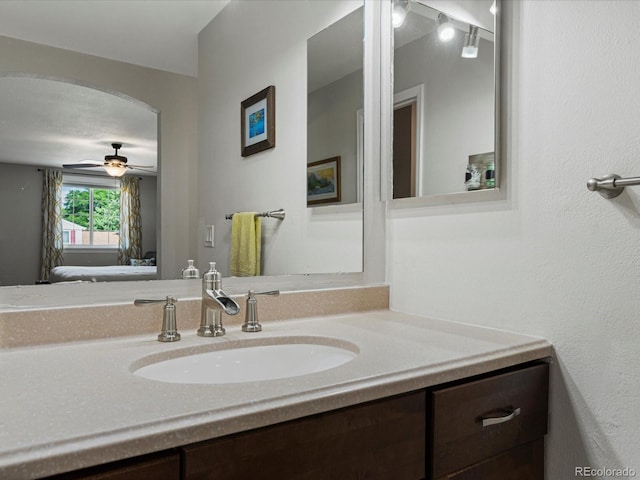 7554 S Ogden Way, Centennial, CO 80122 - ensuite bathroom with vanity and a ceiling fan