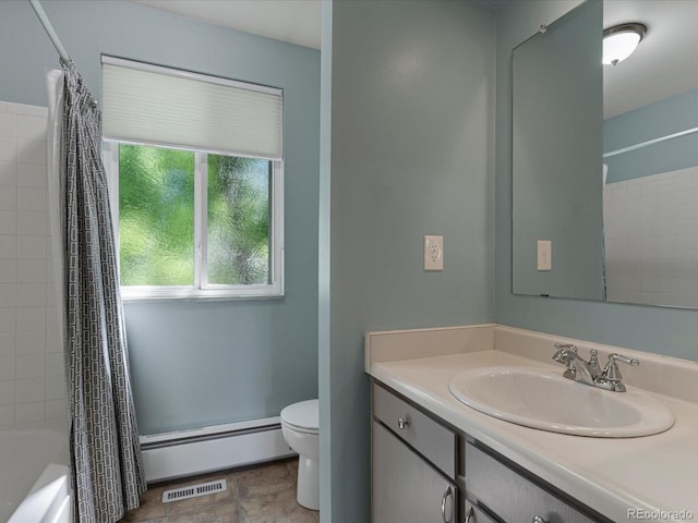 7554 S Ogden Way, Centennial, CO 80122 - bathroom featuring a baseboard heating unit, vanity, and shower / tub combo