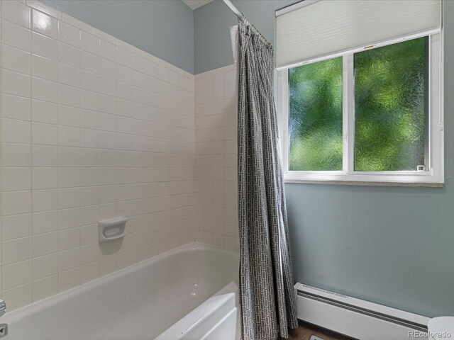 7554 S Ogden Way, Centennial, CO 80122 - bathroom featuring a baseboard radiator and shower / bath combo