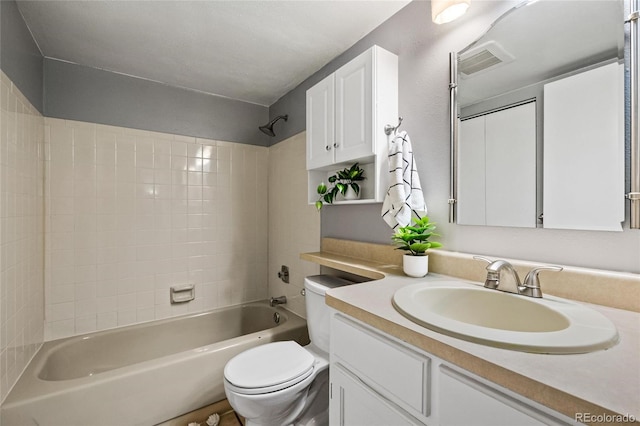 full bathroom with toilet, vanity, and  shower combination