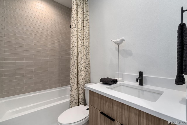 full bathroom featuring vanity, toilet, and shower / bath combo