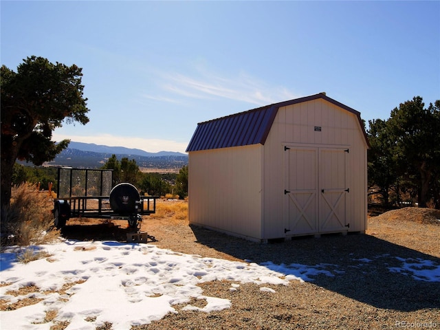 view of outdoor structure with a mountain view