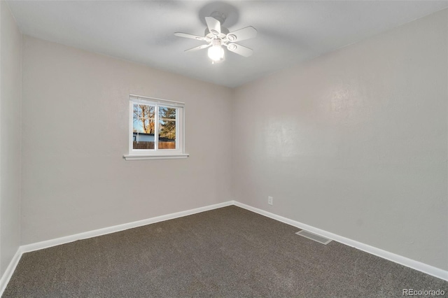 spare room with ceiling fan and carpet flooring