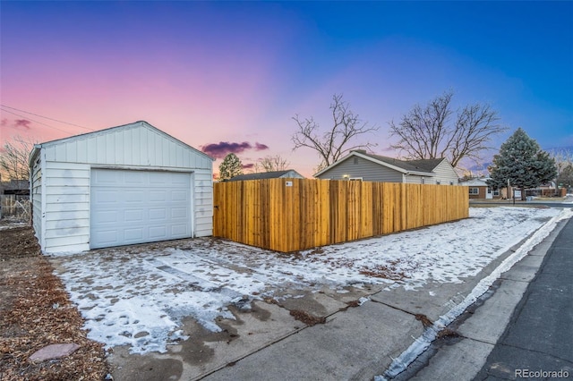 view of snow covered garage