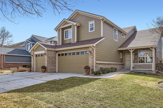 view of front of property with an attached garage, driveway, brick siding, and a front yard