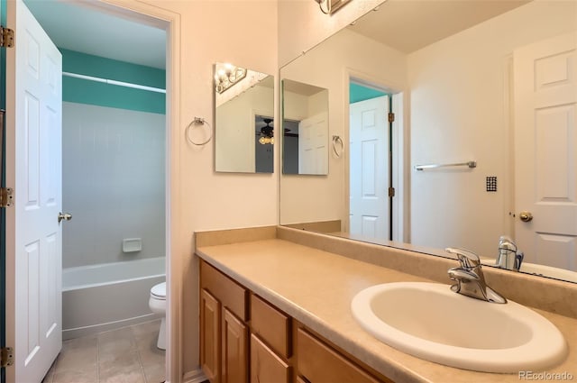 full bath featuring  shower combination, vanity, toilet, and tile patterned floors