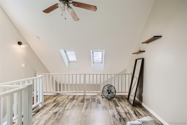 additional living space featuring hardwood / wood-style flooring