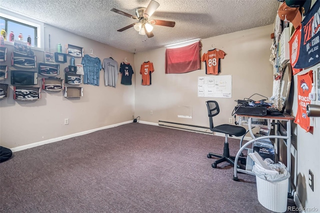 office featuring a textured ceiling, carpet, baseboard heating, and ceiling fan