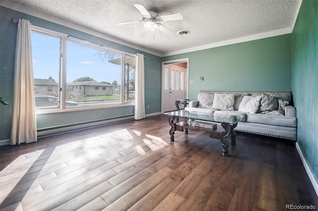 living room with baseboard heating, a ceiling fan, a textured ceiling, wood finished floors, and baseboards