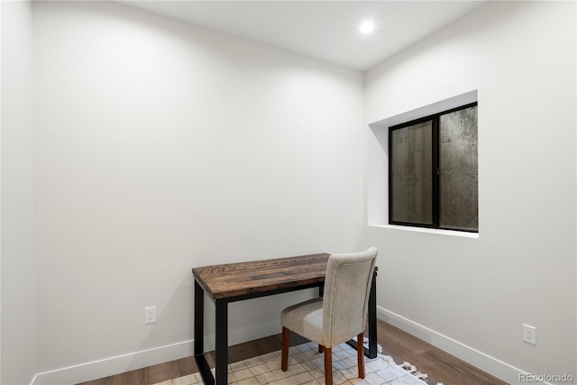 office with light hardwood / wood-style flooring