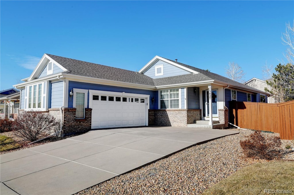 view of front of property with a garage