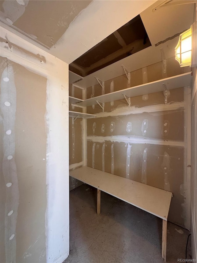 mudroom featuring concrete floors