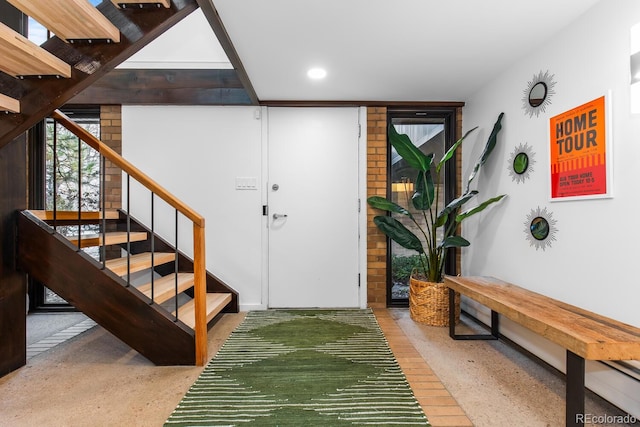 interior space with stairway and recessed lighting