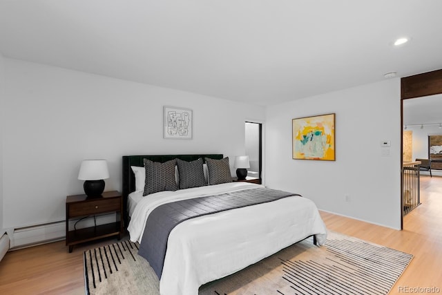 bedroom with light wood-style flooring