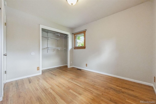 2901 Lorraine Ct, Boulder, CO 80304 - unfurnished bedroom featuring light wood-style floors, baseboards, and a closet