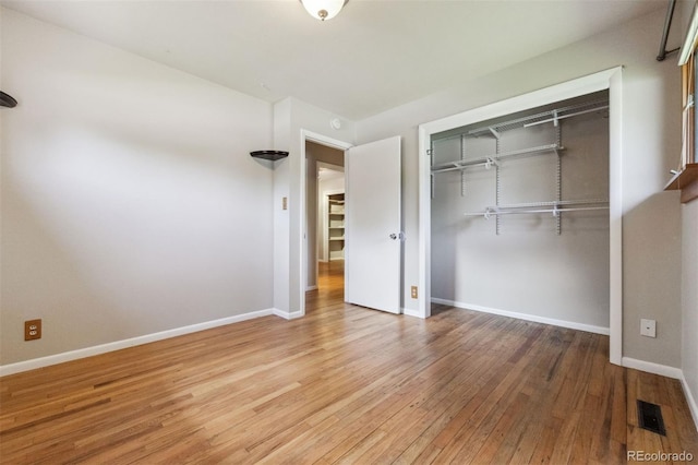 2901 Lorraine Ct, Boulder, CO 80304 - unfurnished bedroom with wood-type flooring, a closet, and baseboards