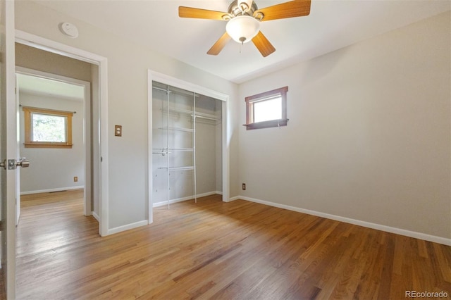 2901 Lorraine Ct, Boulder, CO 80304 - unfurnished bedroom featuring a closet, baseboards, and light wood-type flooring