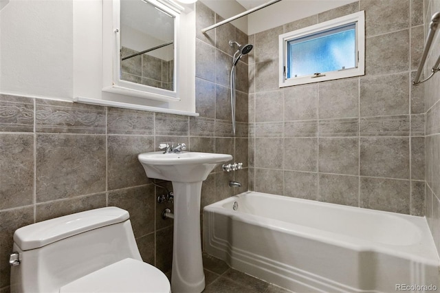 2901 Lorraine Ct, Boulder, CO 80304 - bathroom featuring tile walls, toilet, and  shower combination
