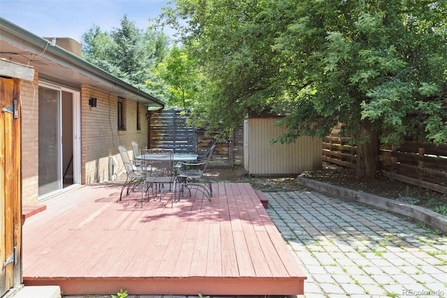 2901 Lorraine Ct, Boulder, CO 80304 - wooden deck with outdoor dining space and a fenced backyard