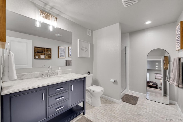 8839 Culebra St, Arvada, CO 80007 - full bath featuring vanity, a stall shower, and recessed lighting