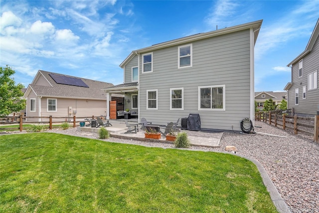 8839 Culebra St, Arvada, CO 80007 - back of house featuring a patio and a fenced backyard