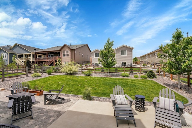 8839 Culebra St, Arvada, CO 80007 - view of patio featuring an outdoor fire pit, a residential view, and stairs