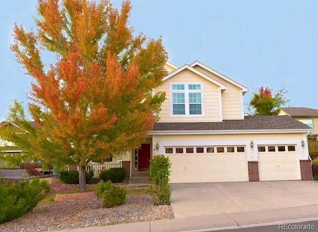 view of front of property featuring a garage