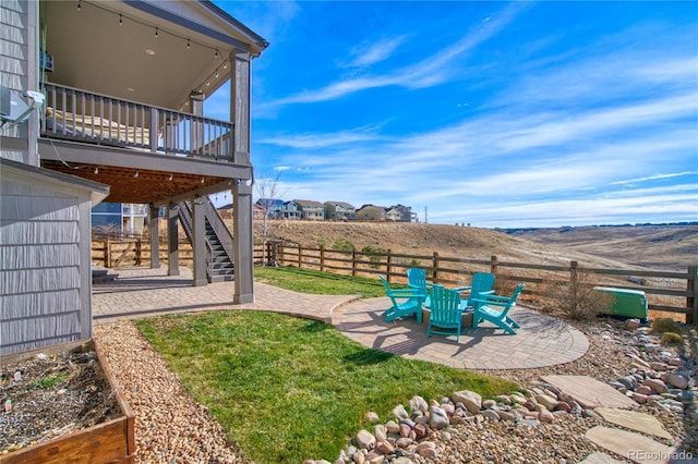 view of yard with a patio area and a wooden deck