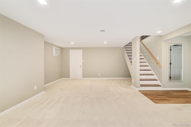 3025 S Norman Ct, Denver, CO 80224 - finished basement with light carpet, stairway, and recessed lighting