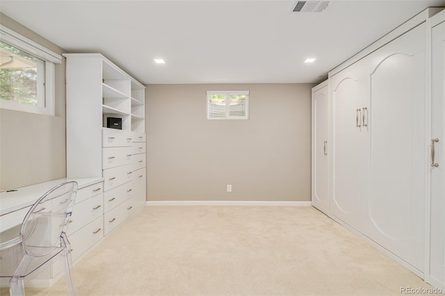 3025 S Norman Ct, Denver, CO 80224 - unfurnished bedroom with light colored carpet and recessed lighting