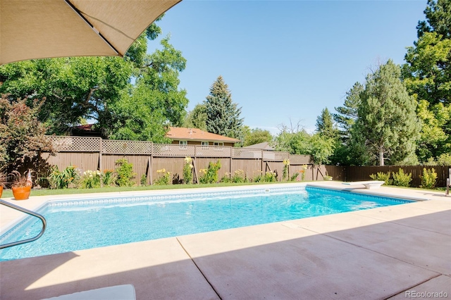 3025 S Norman Ct, Denver, CO 80224 - view of swimming pool with a patio area and a fenced backyard