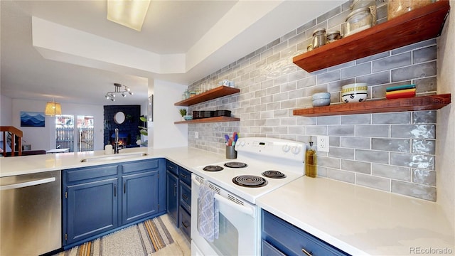 kitchen with dishwasher, sink, blue cabinetry, and electric stove