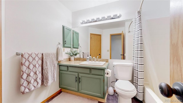 full bathroom with vanity, toilet, and shower / tub combo with curtain