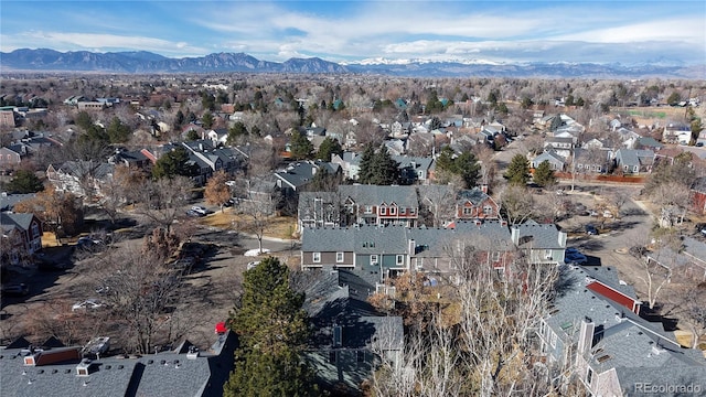 birds eye view of property featuring a mountain view