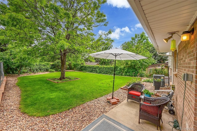962 S Potomac Way, Aurora, CO 80012 - view of yard with a patio