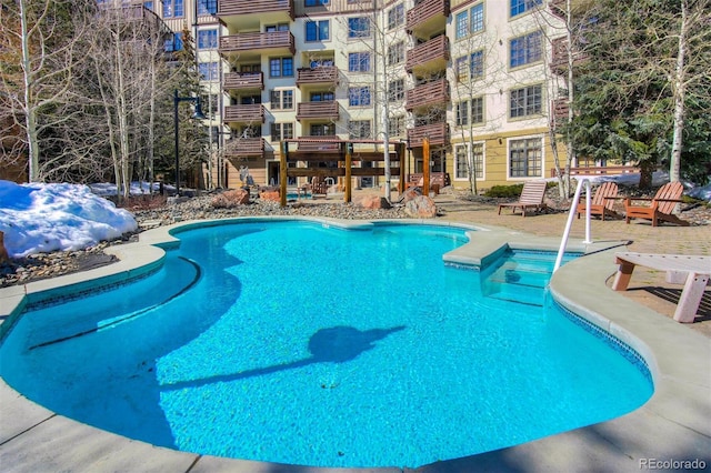 pool with a patio