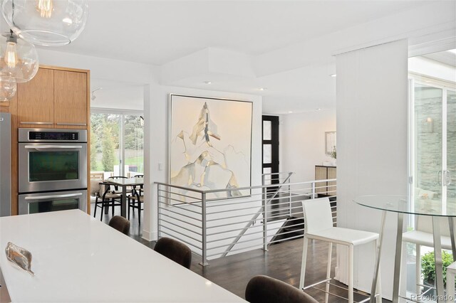 dining space featuring recessed lighting and wood finished floors