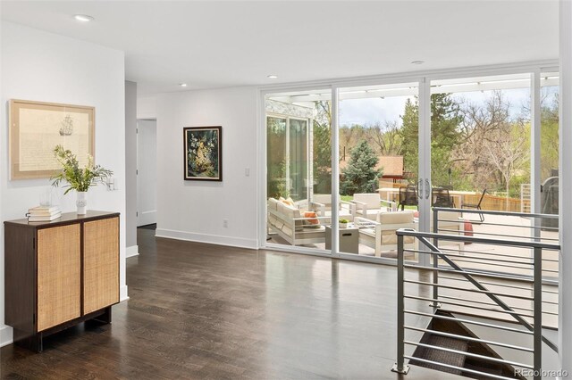doorway to outside with baseboards, recessed lighting, french doors, and wood finished floors