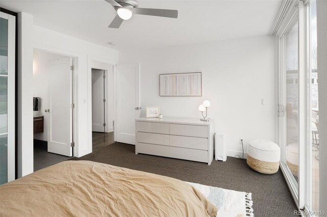 bedroom featuring a ceiling fan, baseboards, and dark colored carpet
