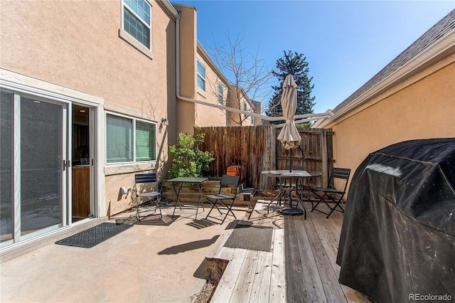 2870 S Ursula St, Aurora, CO 80014 - view of patio / terrace featuring area for grilling, a deck, and fence