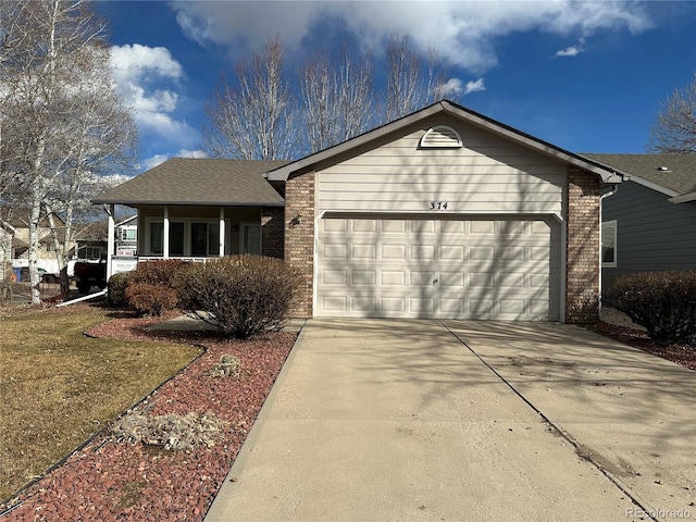 ranch-style house featuring an attached garage, driveway, a shingled roof, and brick siding