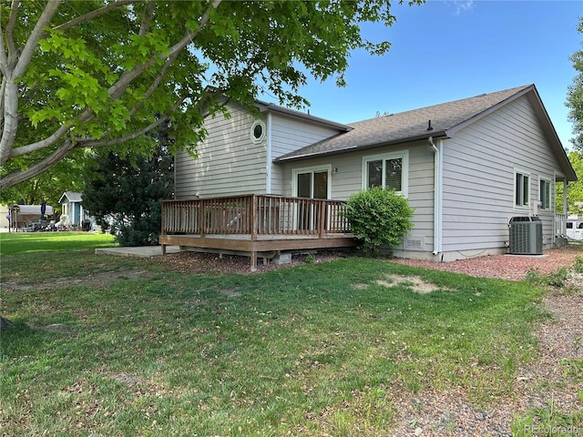 374 Krypton Ct, Loveland, CO 80537 - back of property featuring central air condition unit, a wooden deck, a yard, and a shingled roof