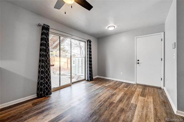 spare room with ceiling fan and hardwood / wood-style flooring