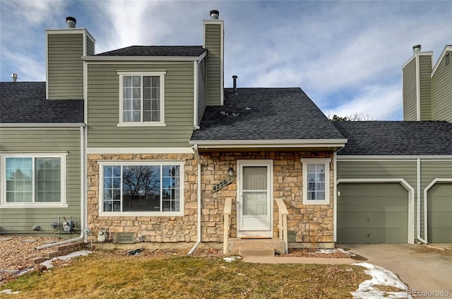 view of front of property featuring a garage