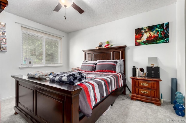 1977 S Oakland Way, Aurora, CO 80014 - bedroom with light carpet, a textured ceiling, and a ceiling fan